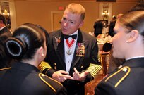 Command Sgt. Maj. Jim Wills, the current interim command sergeant major for the U.S. Army Reserve, speaks with two Soldiers prior to the Allentown Chapter of the Honorary First Defenders dining-in April 15 in Bethlehem, Pennsylvania. Sgt. Maj. of the Army Daniel Dailey was the guest of honor at the event.
