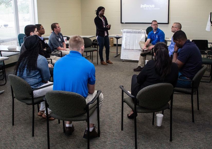 Kimoy Willis (center), an Applied Suicide Intervention Skills Training (ASIST) instructor with the 457th Quartermaster Company leads a small group discussion about the subtle signs of suicide during an ASIST workshop conducted April 15-17, 2016, in Orlando, Fla. More than 25 Army Reserve Soldiers and civilians assigned to the 143rd Sustainment Command (Expeditionary) participated in this three-day workshop to learn how to use scientifically tested tools and methods to provide immediate yet compassionate care to individuals contemplating suicide. (U.S. Army photo by Sgt. John L. Carkeet IV, 143rd Sustainment Command (Expeditionary))