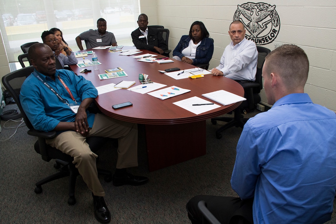 Gerald Felder (left, front row), suicide program manager, 143rd Sustainment Command (Expeditionary), and his students enrolled in an Applied Suicide Intervention Skills Training (ASIST) and Ask, Care, Escort-Suicide Intervention (ACE-SI) workshop conducted April 15-17, 2016, in Orlando, Fla., watch a roleplay scenario depicting a young man determined to end his misery by taking his own life. Roleplaying was one of the many interactive activities that taught 27 Soldiers and civilians from the 143rd ESC how to provide immediate and effective care to individuals contemplating suicide through ASIST’s scientific yet compassionate approach to connecting the potential victim with caring individuals and life-saving resources. Suicides in the Army ranks rose sharply from 45 in 2001 to 165 in 2012. Three years later, this all-time high dropped by nearly 20 percent thanks in part to interactive programs like ASIST. (U.S. Army photo by Sgt. John L. Carkeet IV, 143rd Sustainment Command (Expeditionary))