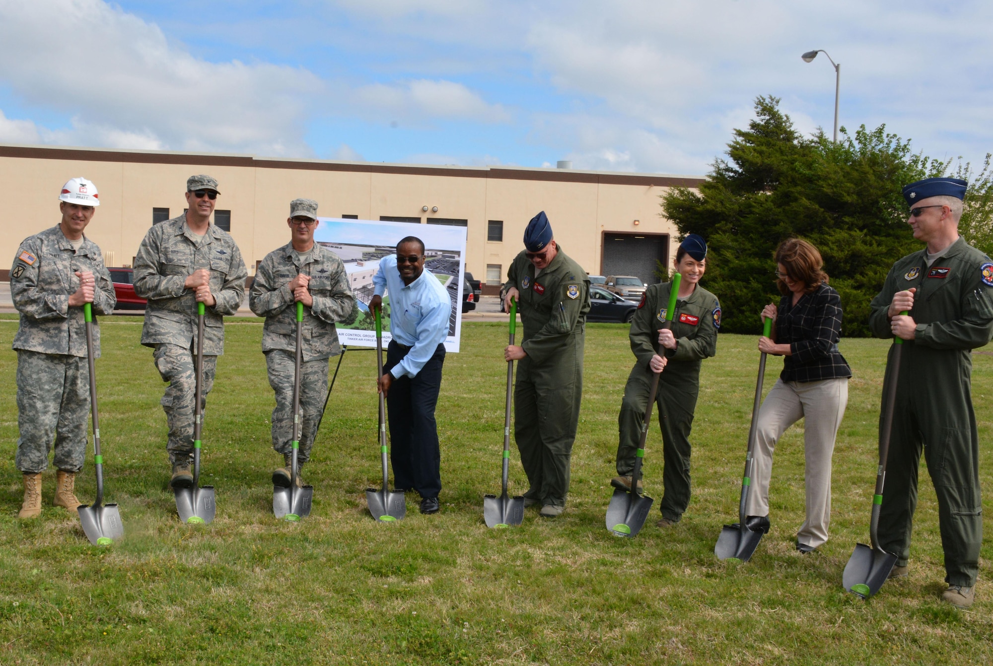 Officials from Tinker Air Force Base, Air Force Reserve, Fortis Networks, Inc. and the U.S. Army Corps of Engineers break ground for the future 513th Air Control Group operations building here during a ceremony April 14, 2016.
Pictured left to right is Col. Richard Pratt, Army Corps of Engineers, Tulsa District commander, Col. Bradley Bird, 552nd Air Control Wing vice commander, Chief Master Sgt. Jeffrey Davis, 513th Air Control Group command chief, Clarence McAllister, Fortis Networks, Inc., Col. David  Robertson, 513th Air Control Group commander, Lt. Col. Jennifer Cress, 513th Operations Support Squadron commander, Cathy Scheirman, 72nd Air Base Wing Civil Engineer Directorate chief and Lt. Col. Jim Mattey, 970th Airborne Air Control Squadron director of operations.
(U.S. Air Force Photo/Maj. Jon Quinlan)
