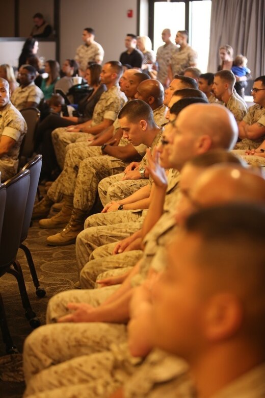 Marines listen to speakers at the volunteer appreciation ceremony aboard Marine Corps Air Station Miramar, Calif., April 14. The ceremony is held each year during National Volunteer Appreciation Week to acknowledge the contributions volunteers make to the MCAS Miramar and San Diego communities. (U.S. Marine Corps photo by Pfc. Liah Kitchen/Released)