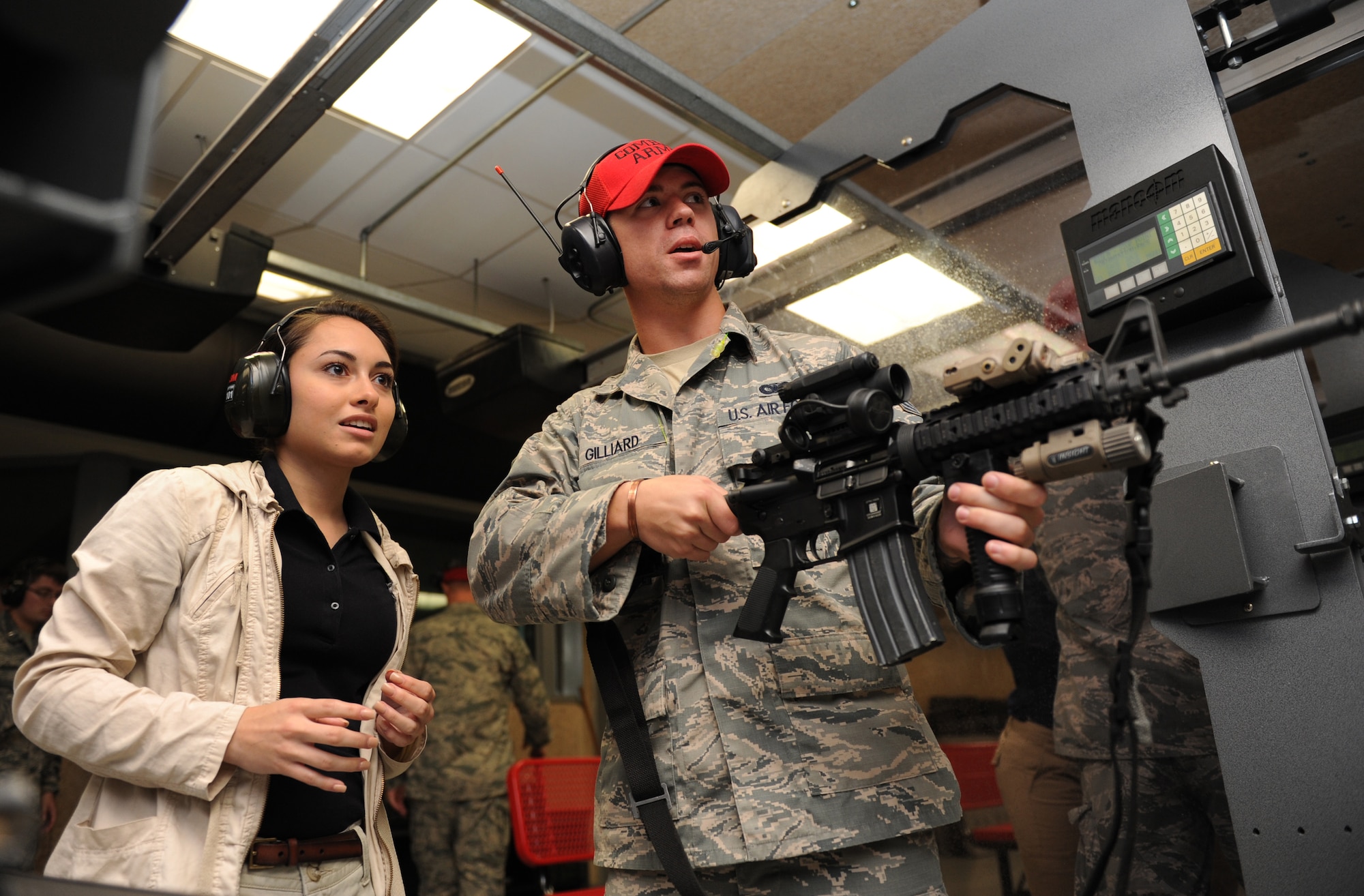 Gabriela Valle-Ramos, University of Alabama Air Force ROTC Cadet, receives M-4 weapon operating instructions from Senior Airman Caleb Gilliard, 81st Security Forces Squadron combat arms instructor, at the 81st SFS combat arms training and maintenance building during Pathways to Blue April 15, 2016, Keesler Air Force Base, Miss. Pathways to Blue, a diversity outreach event hosted by 2nd Air Force, the 81st Training Wing and the 403rd Wing, included more than 180 cadets from Air Force ROTC detachments from various colleges and universities. Cadets received hands-on briefings on technical and flying operations and an orientation flight in support of the Air Force's Diversity Strategic Roadmap program. (U.S. Air Force photo by Kemberly Groue)