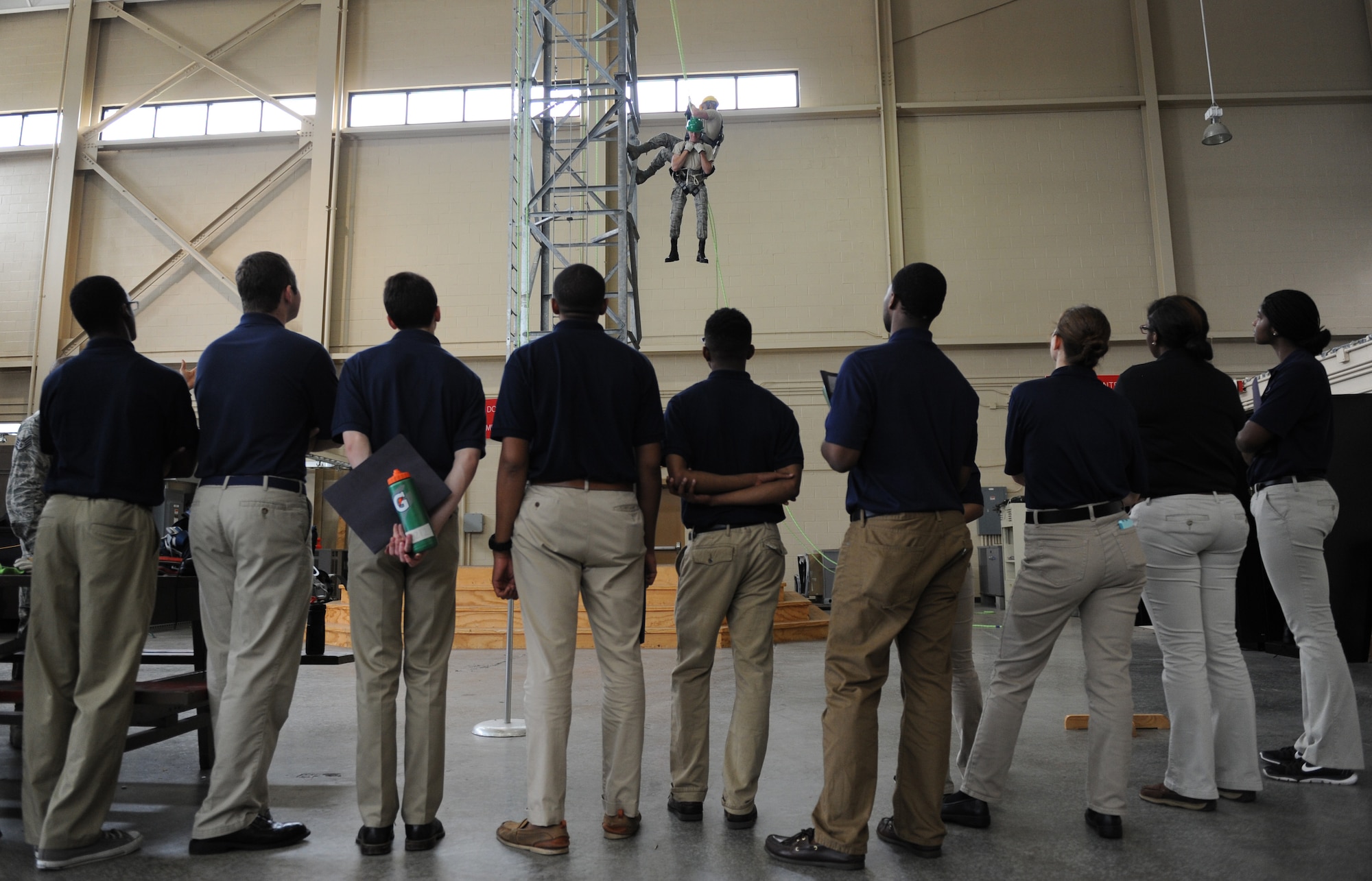Air Force ROTC cadets watch a tower demonstration by members of the 334th Training Squadron at Matero Hall during Pathways to Blue April 15, 2016, Keesler Air Force Base, Miss. Pathways to Blue, a diversity outreach event hosted by 2nd Air Force, the 81st Training Wing and the 403rd Wing, included more than 180 cadets from Air Force ROTC detachments from various colleges and universities. Cadets received hands-on briefings on technical and flying operations and an orientation flight in support of the Air Force's Diversity Strategic Roadmap program. (U.S. Air Force photo by Kemberly Groue)