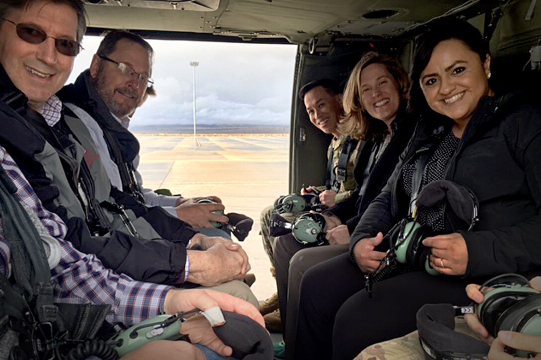 U.S. Army Corps of Engineers South Pacific Division commander, Brig. Gen. Mark Toy and other Sacramento District staff members take off from Hill Air Force Base during a three-day tour March 29-31, 2016, of project sites throughout the states of Utah. During the flight to Dugway Proving Ground, Toy was briefed on regulatory projects including the Narrows Dam, which may require mitigation for more than 70 acres of wetlands and the West Davis Corridor, a 20-mile-long highway located in the Great Salt Lake area. (U.S. Army photo / Released)