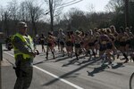 Staff Sgt. Ben Roncarati, a security police officer with the 104th Security Forces Squadron of the 104th Fighter Wing, looks on as runners begin the 120th Boston Marathon in Hopkinton, Massachusetts., April 18, 2016. More than 500 Guard members helped local law enforcement keep the route clear for an estimated 23,000 runners. 