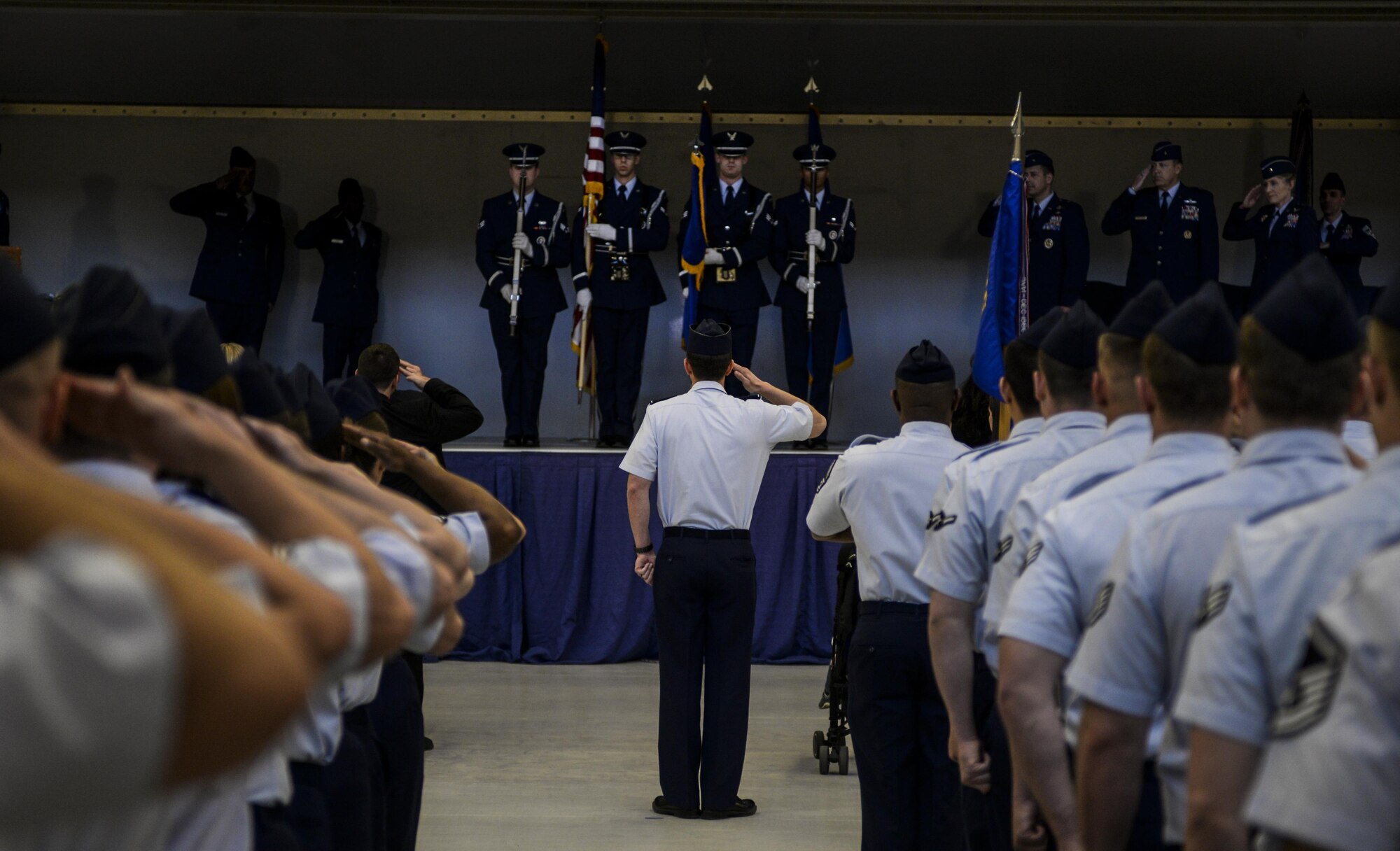 Brig. Gen. Christopher Short receives his final salute from the 57th Wing during the change of command ceremony at the Strike Aircraft Maintenance at Nellis Air Force Base, Nev., April 16, 2016. Short was the commander of the 57th WG since March of 2014. (U.S. Air Force photo by Airman 1st Class Kevin Tanenbaum)
