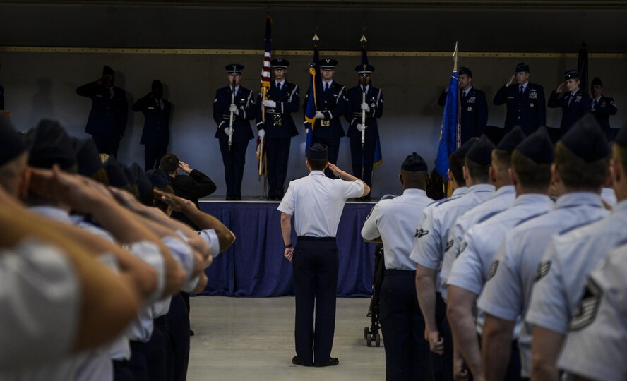 Brig. Gen. Christopher Short receives his final salute from the 57th Wing during the change of command ceremony at the Strike Aircraft Maintenance at Nellis Air Force Base, Nev., April 16, 2016. Short was the commander of the 57th WG since March of 2014. (U.S. Air Force photo by Airman 1st Class Kevin Tanenbaum)