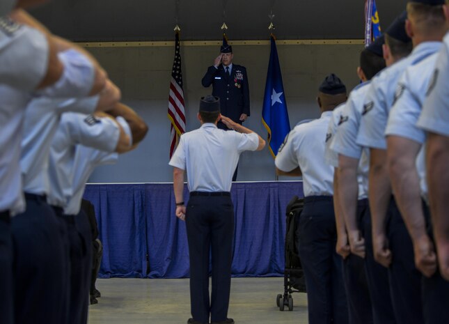 Brig. Gen. Christopher Short receives his final salute from the 57th Wing during the change of command ceremony at the Strike Aircraft Maintenance at Nellis Air Force Base, Nev., April 16, 2016. Short was the commander of the 57th WG since March of 2014. (U.S. Air Force photo by Airman 1st Class Kevin Tanenbaum)