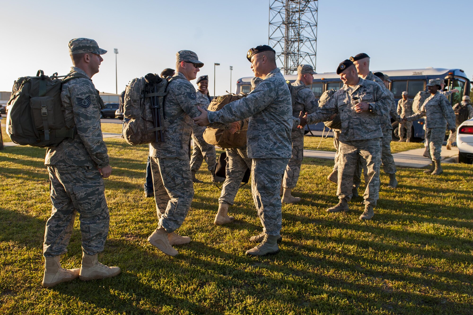 U.S. Air Force Airmen from the 822d Base Defense Squadron shake the hands of leadership before departing for a deployment, April 18, 2016, at Moody Air Force Base, Ga. The 822d BDS is prepared to protect Air Expeditionary Forces around the globe at a moment’s notice by providing fully-integrated, highly capable and responsive forces. (U.S. Air Force photo by Airman 1st Class Lauren M. Hunter/Released)