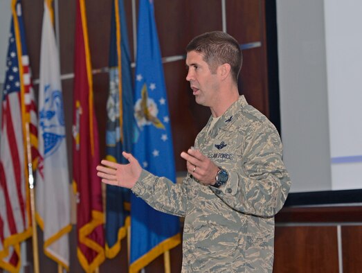 Col. Lance Pilch, 33rd Fighter Wing commander, shares the results of his one question retention survey at a commanders call April 15, 2016, that asked “I would stay in the Air Force longer if…” at Eglin Air Force Base. The colonel received 250 responses that outlined money, time, control or transparency in assignment processes, and leadership as issues impacting Airmen’s decisions to stay in the Air Force. The survey is meant to find factors Airmen feel need to change in the military to improve retention.  (U.S. Air Force photo/Senior Airman Andrea Posey)
