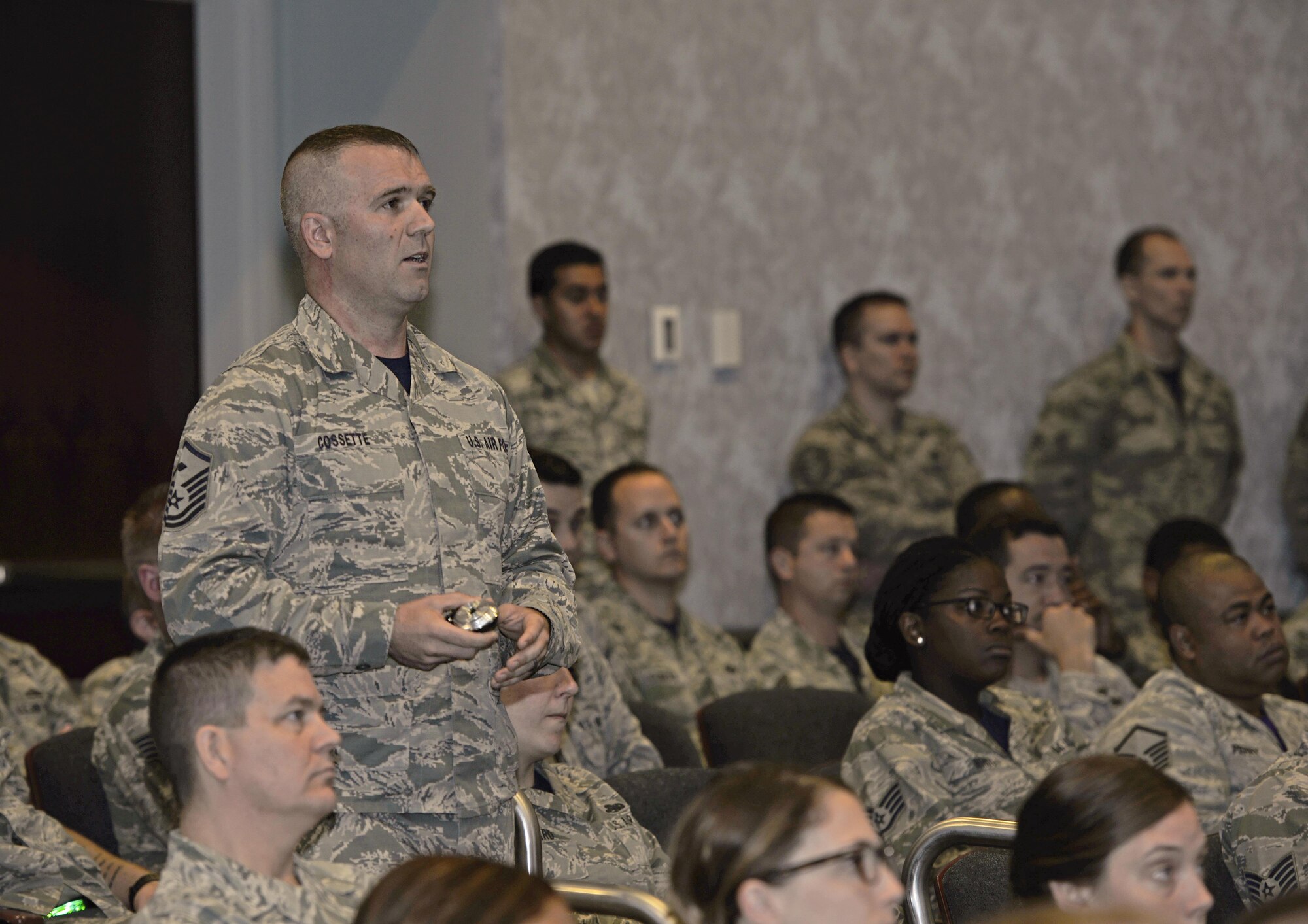 Master Sgt. Loren Cossette, 33rd Maintenance Group first sergeant, explains military pay basics and benefits April 15, 2016, at Eglin Air Force Base. Cossette stressed two factors Airmen should consider when thinking of leaving the Air Force: understanding their military pay and benefits and comparing them to civilian job compensation. This brief was part of the 33rd Fighter Wing commander’s call about retention survey results and local improvement efforts. (U.S. Air Force photo/Senior Airman Andrea Posey)