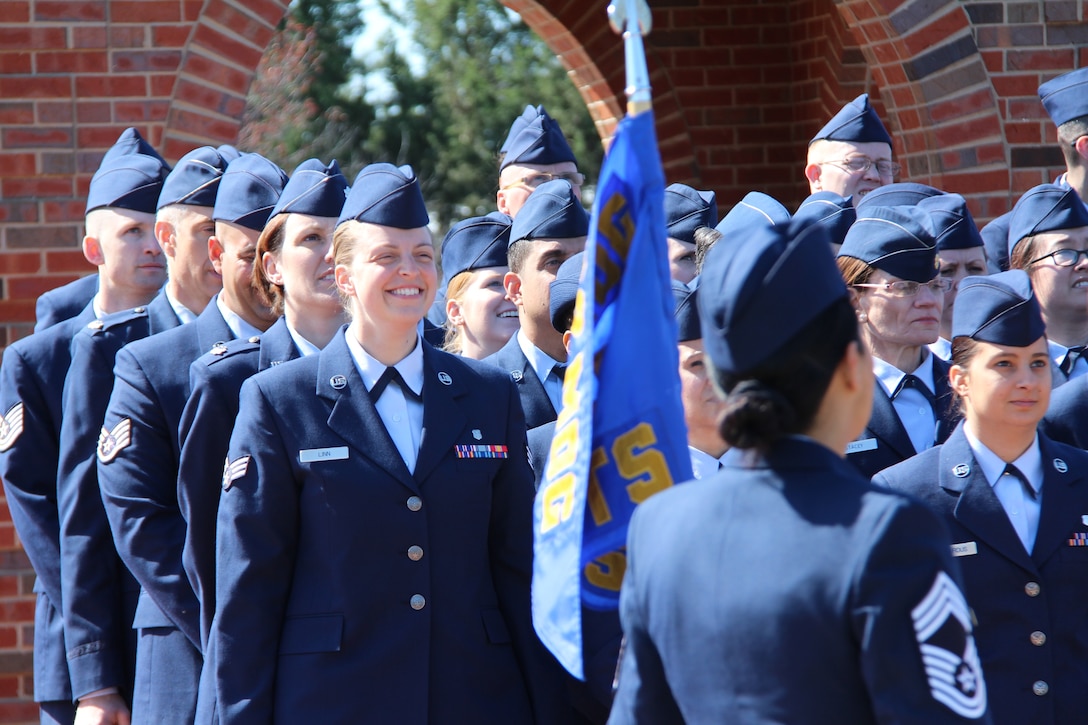 932nd Medical Group members of the 932nd Aeromedical Staging Squadron, get into formation on a clear sunny morning for open ranks inspection during a Unit Training Assembly at Scott Air Force Base near Belleville.  (U.S. Air Force photo by Maj. Stan Paregien)