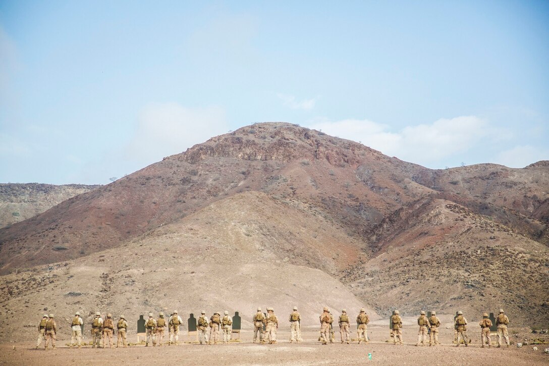 DJIBOUTI, Africa (Apr. 14, 2016)- U.S. Marines with the 13th Marine Expeditionary Unit prepare to shoot at the five meter line on a live fire range in Djibouti, Africa, Apr. 14, 2016. The 13th MEU is conducting sustainment training to maintain proficiency and combat readiness as part of the Boxer Amphibious Ready Group team on a scheduled deployment to the Western Pacific area of operations. (U.S. Marine Corps photo by 1stLt Francheska Soto/ RELEASED)