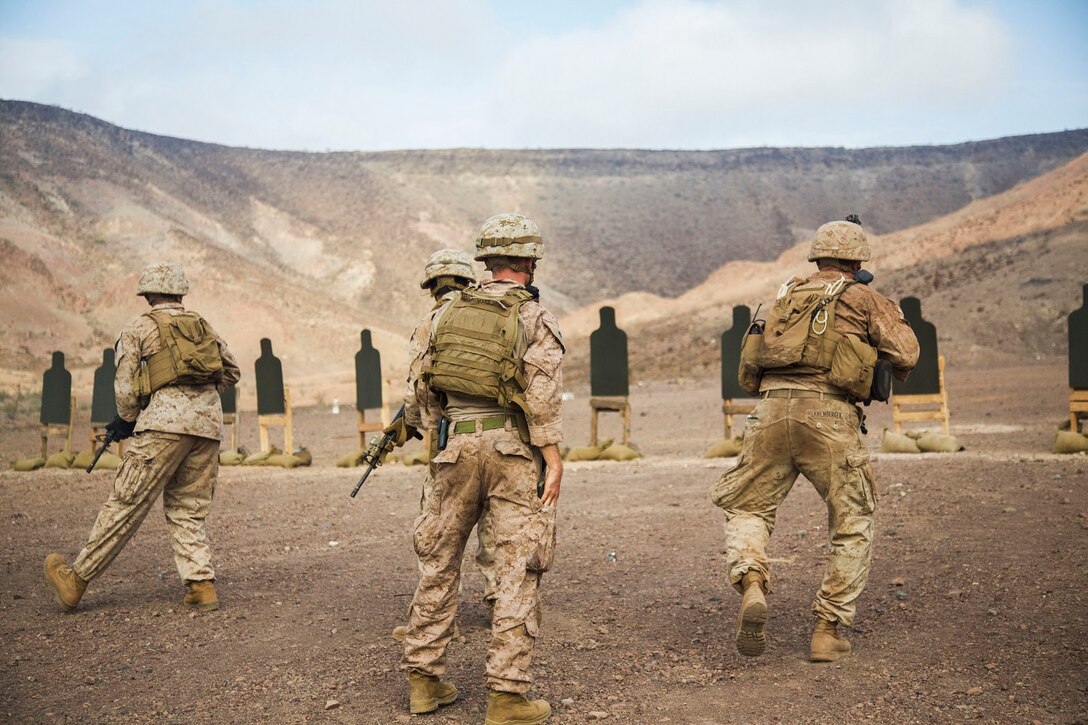 DJIBOUTI, Africa (Apr. 14, 2016)- U.S. Marines with the 13th Marine Expeditionary Unit pivot to the right to engage targets during a live fire range in Djibouti, Africa, Apr. 14, 2016. The 13th MEU is conducting sustainment training to maintain proficiency and combat readiness as part of the Boxer Amphibious Ready Group team on a scheduled deployment to the Western Pacific area of operations. (U.S. Marine Corps photo by 1stLt Francheska Soto/ RELEASED)