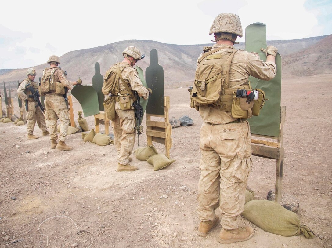 DJIBOUTI, Africa (Apr. 14, 2016)- U.S. Marines with the 13th Marine Expeditionary Unit repair their targets in preparation for the next group of shooters in Djibouti, Africa, Apr. 14, 2016. The 13th MEU is conducting sustainment training to maintain proficiency and combat readiness as part of the Boxer Amphibious Ready Group team on a scheduled deployment to the Western Pacific area of operations. (U.S. Marine Corps photo by 1stLt Francheska Soto/ RELEASED)