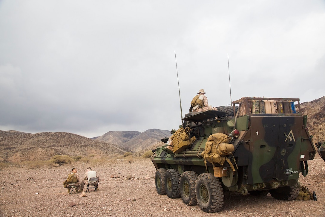 DJIBOUTI, Africa (Apr. 10, 2016)-U.S. Marines and Sailors with the 13th Marine Expeditionary Unit set into a security posture of a Light Armored Reconaissance position in Djibouti, Africa, Apr. 9, 2016. The 13th MEU is conducting sustainment training to maintain proficiency and combat readiness as part of the Boxer Amphibious Ready Group team on a scheduled deployment to the Western Pacific area of operations. (U.S Marine Corps photo by 1stLt Francheska Soto/ RELEASED)