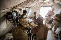 U.S. Marines and Sailors with the 13th Marine Expedtionary Unit conduct a casualty evacuation drill to maintain proficiency in Djibouti, Africa, Apr. 16, 2016. The 13th MEU is conducting sustainment training to maintain proficiency and combat readiness as part of the Boxer Amphibious Ready Group on a scheduled deployment to the Western Pacific area of responsibility. (U.S. Marine Corps photo by Cpl. Alvin Pujols/RELEASED)