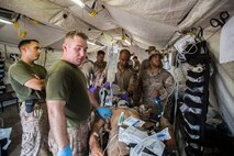 U.S. Marines and Sailors with the 13th Marine Expedtionary Unit conduct a casualty evacuation drill to maintain proficiency in Djibouti, Africa, Apr. 16, 2016. The 13th MEU is conducting sustainment training to maintain proficiency and combat readiness as part of the Boxer Amphibious Ready Group on a scheduled deployment to the Western Pacific area of responsibility. (U.S. Marine Corps photo by Cpl. Alvin Pujols/RELEASED)