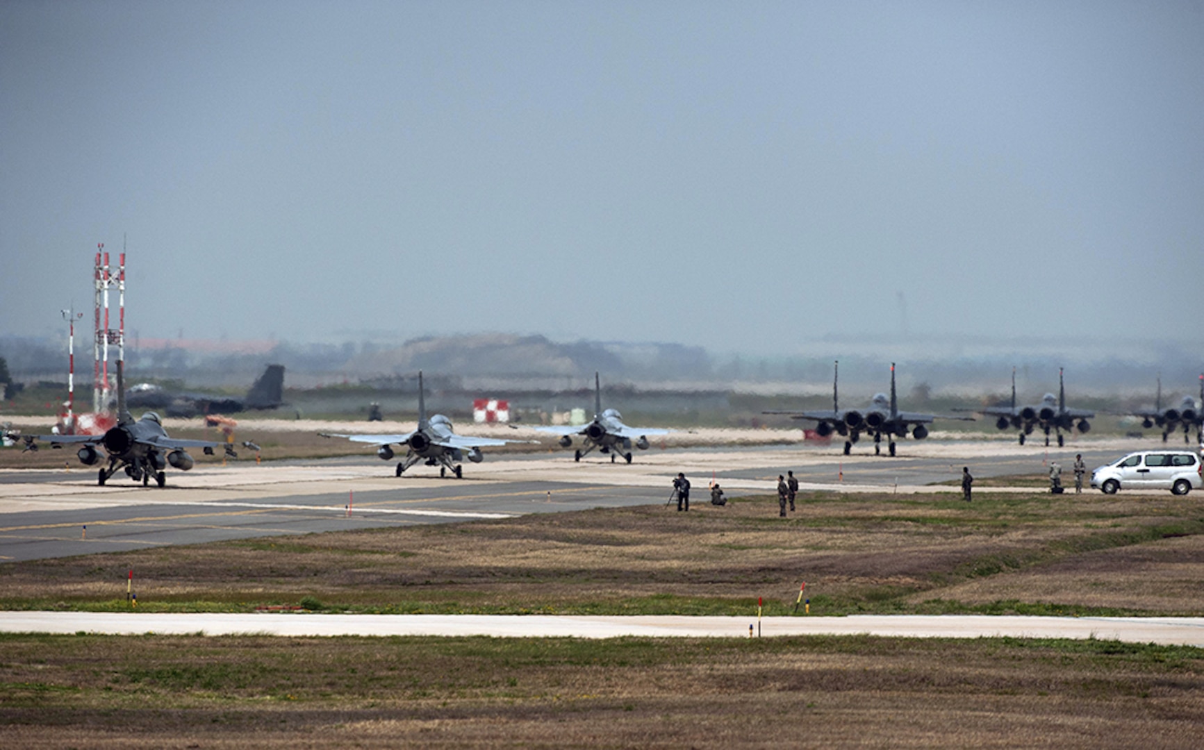 KUNSAN AIR BASE, Republic of Korea (April 18, 2016) - Aircraft from the 8th Fighter Wing, 19th Fighter Wing, Jungwon Air Base, Republic of Korea (ROK), and the 11th Fighter Wing, Daegu Air Base, ROK, taxi towards the runway during Max Thunder 16.  Exercise Max Thunder is part of a continuous exercise program to enhance interoperability between U.S. and ROK forces. 