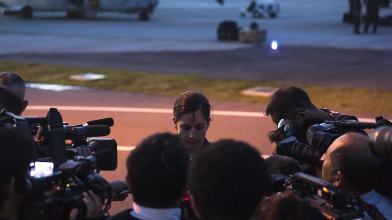 Japanese media interview Capt. Tessa Snow, an MV-22B Osprey pilot with Marine Medium Tiltrotor Squadron (VMM) 265 attached to the 31st Marine Expeditionary Unit at Marine Corps Air Station Iwakuni, Japan, in support of the Government of Japan’s relief efforts following yesterday’s devastating earthquake near Kumamoto April 17, 2016. The long-standing relationship between Japan and the U.S. allows U.S. military forces in Japan to provide rapid, integrated support to the Japan Self-Defense Forces and civil relief efforts. (U.S. Marine Corps photo by Lance Cpl. Jacob A. Farbo/Released)