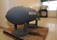 Ed Kaluza’s time capsule bomb sits in the old Geiger Field base dining facility on the grounds of Spokane International Airport in Spokane, Wash., April 6, 2016. The time capsule has moved around the Inland Northwest many times since the 1940s. (U.S. Air Force photo/Senior Airman Sam Fogleman)