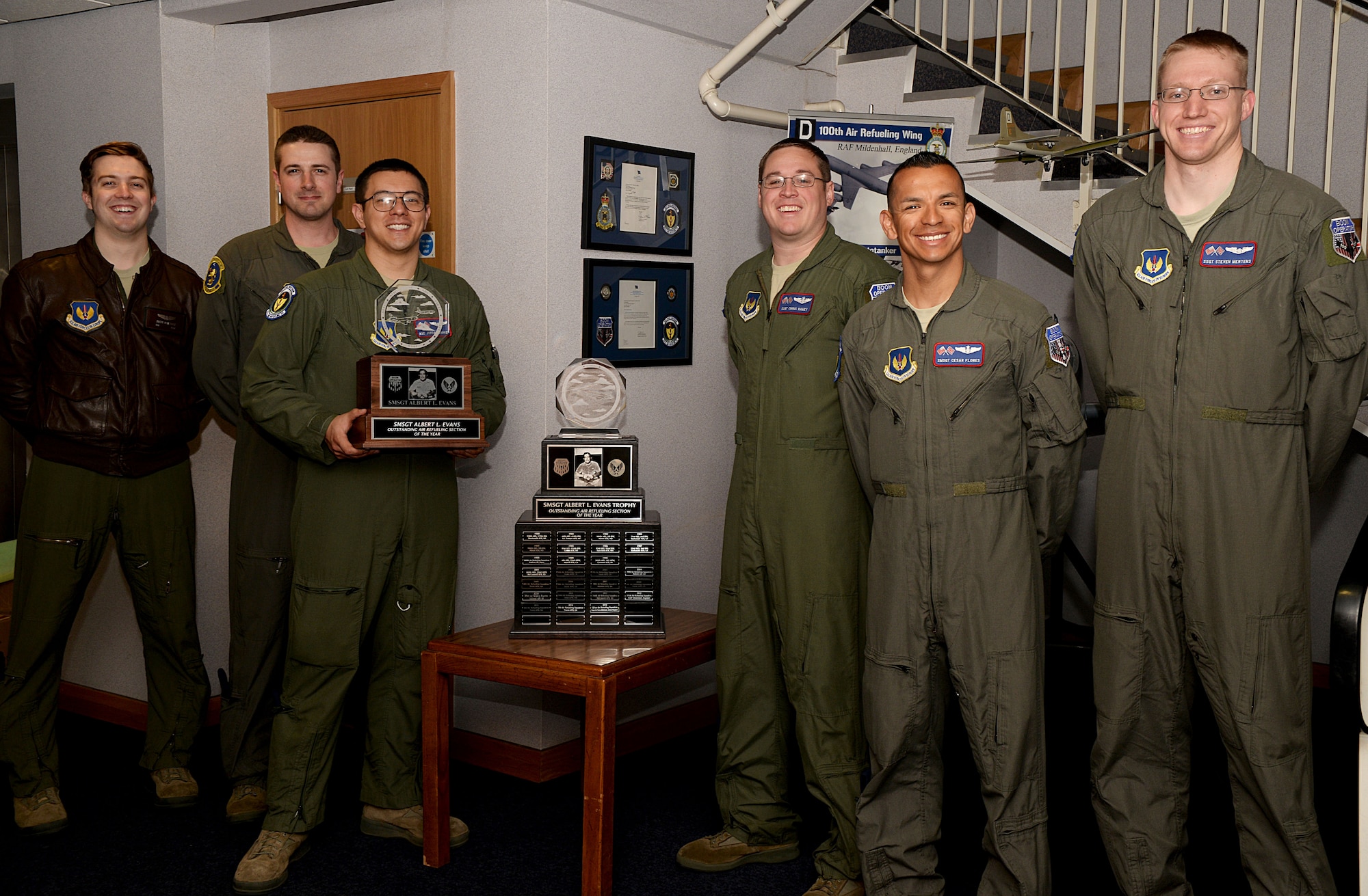 U.S. Air Force Airmen from the 351st Air Refueling Squadron gather for a photograph with the Senior Master Sgt. Albert L. Evans Outstanding Air Refueling Section of the Year Award April 18, 2016, on RAF Mildenhall, England. Every year this award recognizes the best in-flight boom operator section within the U.S. Air Force. The Evans trophy was established in memory of Senior Master Sgt. Albert L. Evans, a pioneer in the history of Strategic Air Command’s air refueling operations. (U.S. Air Force photo by Airman 1st Class Tenley Long/Released)
