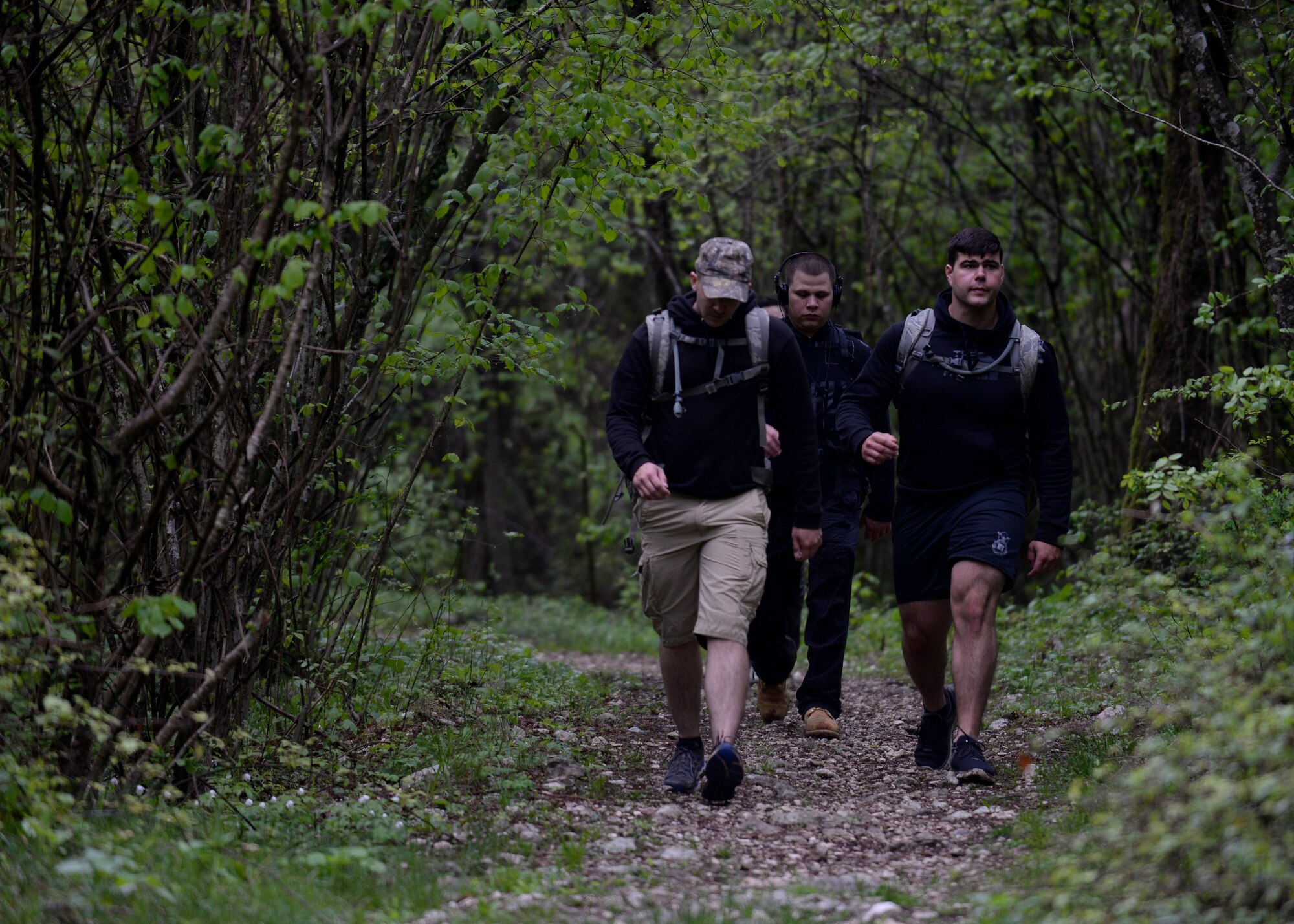 Airmen from the 31st Security Forces Squadron participate in a ruck march, April 14, 2016, in Costa di Aviano, Italy. The march started with reading the names of U.S. Air Force Office of Special Investigations and SF members who died in a December, 2015, attack, a moment of silence, followed by a 7 kilometer hike along the Il Santuario Diocesano Madonna del Monte church trails. (U.S. photo by Airman 1st Class Cary Smith/Released)