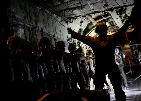 NATO and U.S. service members and participate in a jump exchange prior to Saber Junction 16, April 5, 2016, in Northern Italy. The exercise involved the 173rd Airborne Brigade and 16 allied and European nations conducting land operations in a joint, combined environment and to promote interoperability with participating nations. (U.S. Air Force photo by Senior Airman Areca T. Bell/Released)