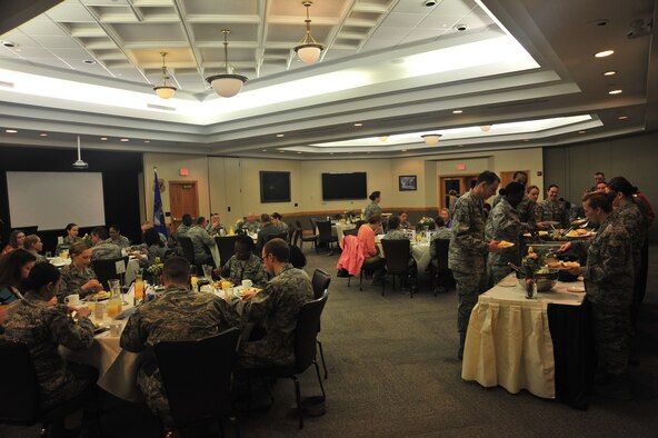 Members of Team Whiteman partake in the breakfast meal during the Women’s History Breakfast at Whiteman Air Force Base, Mo., March 30, 2016. More than 50 people attended the breakfast to include civilians and Airmen. (U.S. Air Force photo by Senior Airman Jovan Banks)