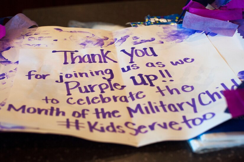 April 15 is National Purple Up day, a time to show support for military families. Month of the Military Child is an annual celebration during April and is a time to honor military youth for the important role they play contributing to the strength of the military family. (U.S. Air Force photo by Airman 1st Class Rustie Kramer/Released)

