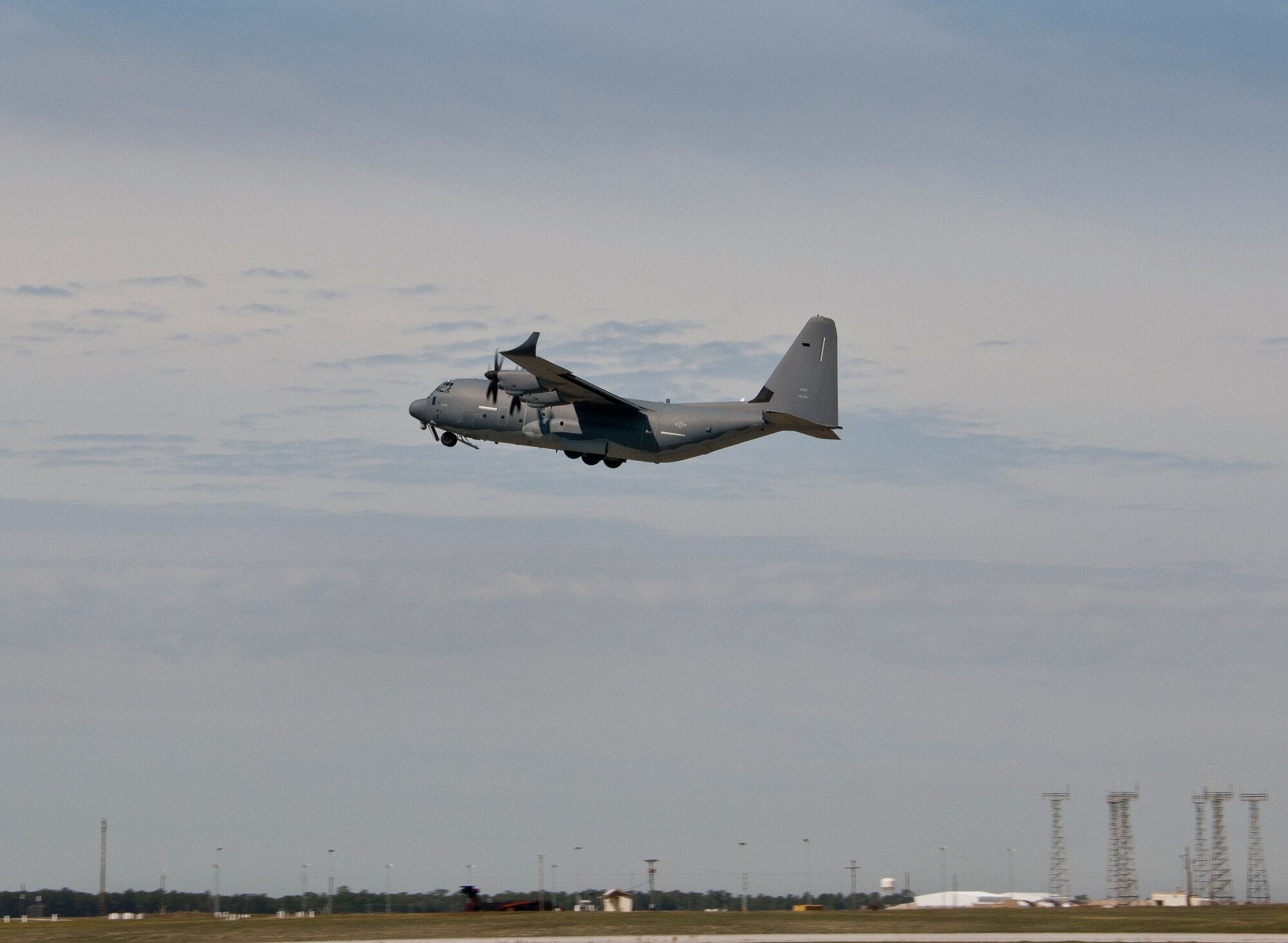 A modified MC-130J lifts off from Eglin Air Force Base, Fla., for a test mission. The aircraft was fitted with vertical fins on each wing, called winglets.  The 413th Flight Test Squadron aircrew and engineers tested the modified aircraft over eight flights.  The goal of the tests was to collect data on possible fuel efficiency improvements and performance with the winglets and lift distribution control system installed.  (U.S. Air Force photo/Samuel King Jr.)