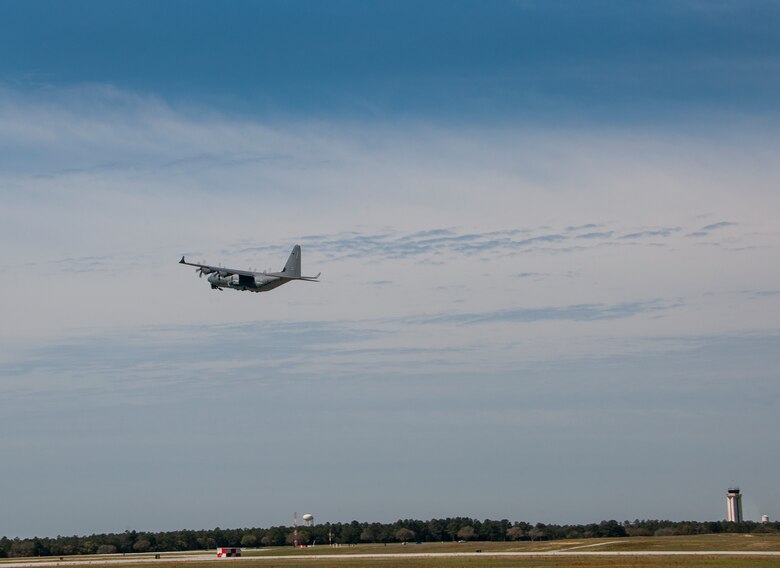 A modified MC-130J lifts off from Eglin Air Force Base, Fla., for a test mission. The aircraft has been fitted with vertical fins on each wing, called winglets.  The 413th Flight Test Squadron aircrew and engineers tested the modified aircraft over eight flights.  The goal of the tests was to collect data on possible fuel efficiency improvements and performance with the winglets and lift distribution control system installed.  (U.S. Air Force photo/Samuel King Jr.)