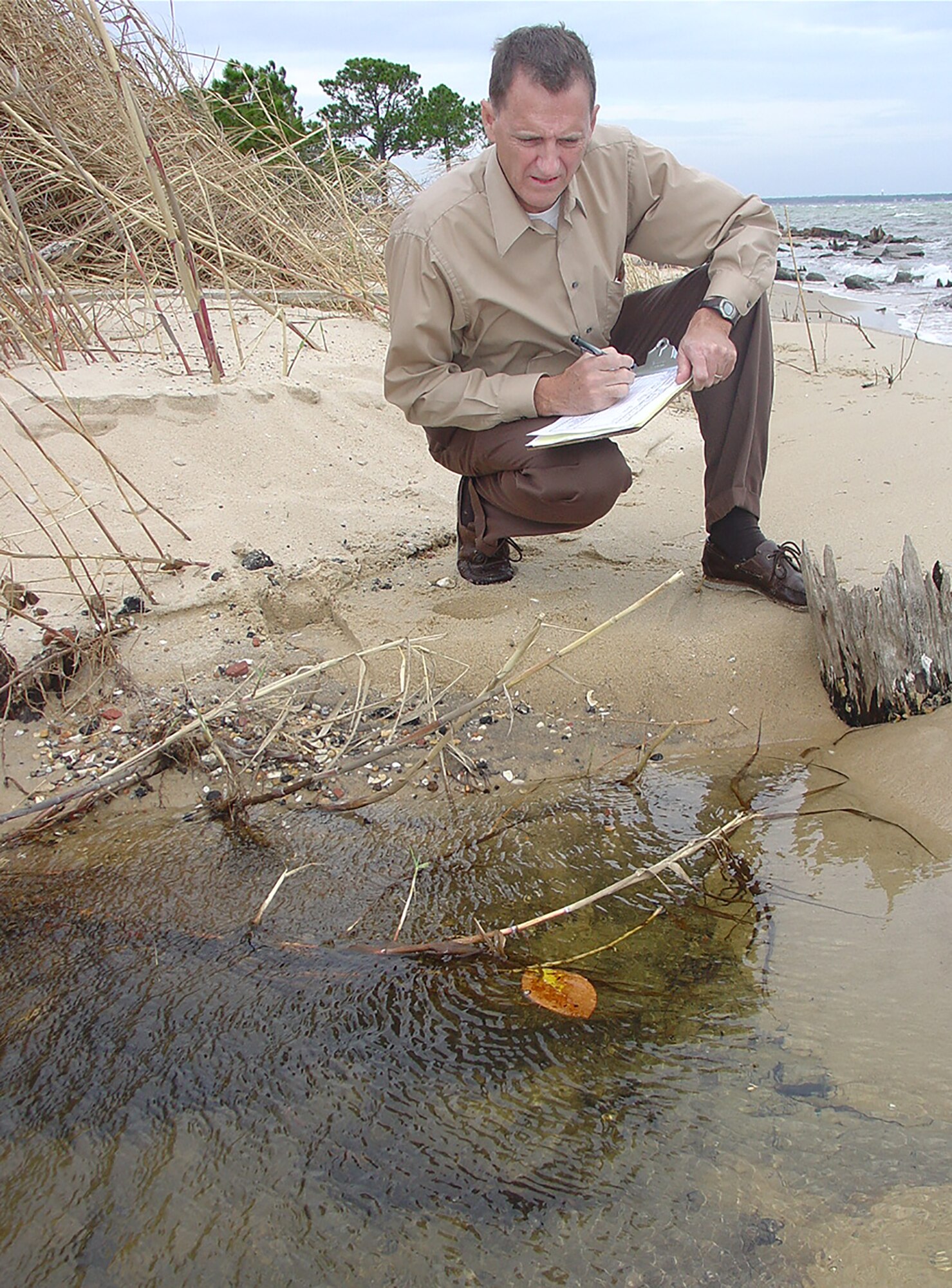 Water Quality: An Environmental Quality Team member checks a culvert for storm water compliance on Eglin. Due to the Team’s efforts, the Florida Department of Environmental Protection granted Eglin a waiver for reduced sampling protocol saving more than $13,000 per sampling cycle.
