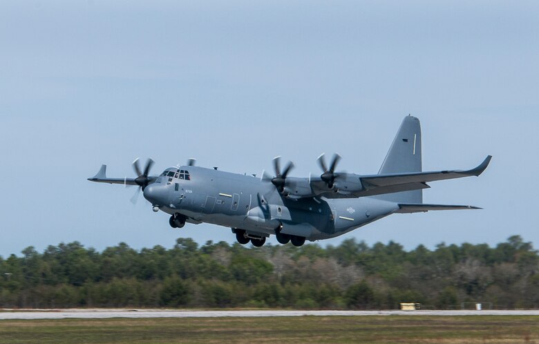 A modified MC-130J lifts off from Eglin Air Force Base, Fla., for a test mission. The aircraft has been fitted with vertical fins on each wing, called winglets.  The 413th Flight Test Squadron aircrew and engineers tested the modified aircraft over eight flights.  The goal of the tests was to collect data on possible fuel efficiency improvements and performance with the winglets and lift distribution control system installed.  (U.S. Air Force photo/Samuel King Jr.)