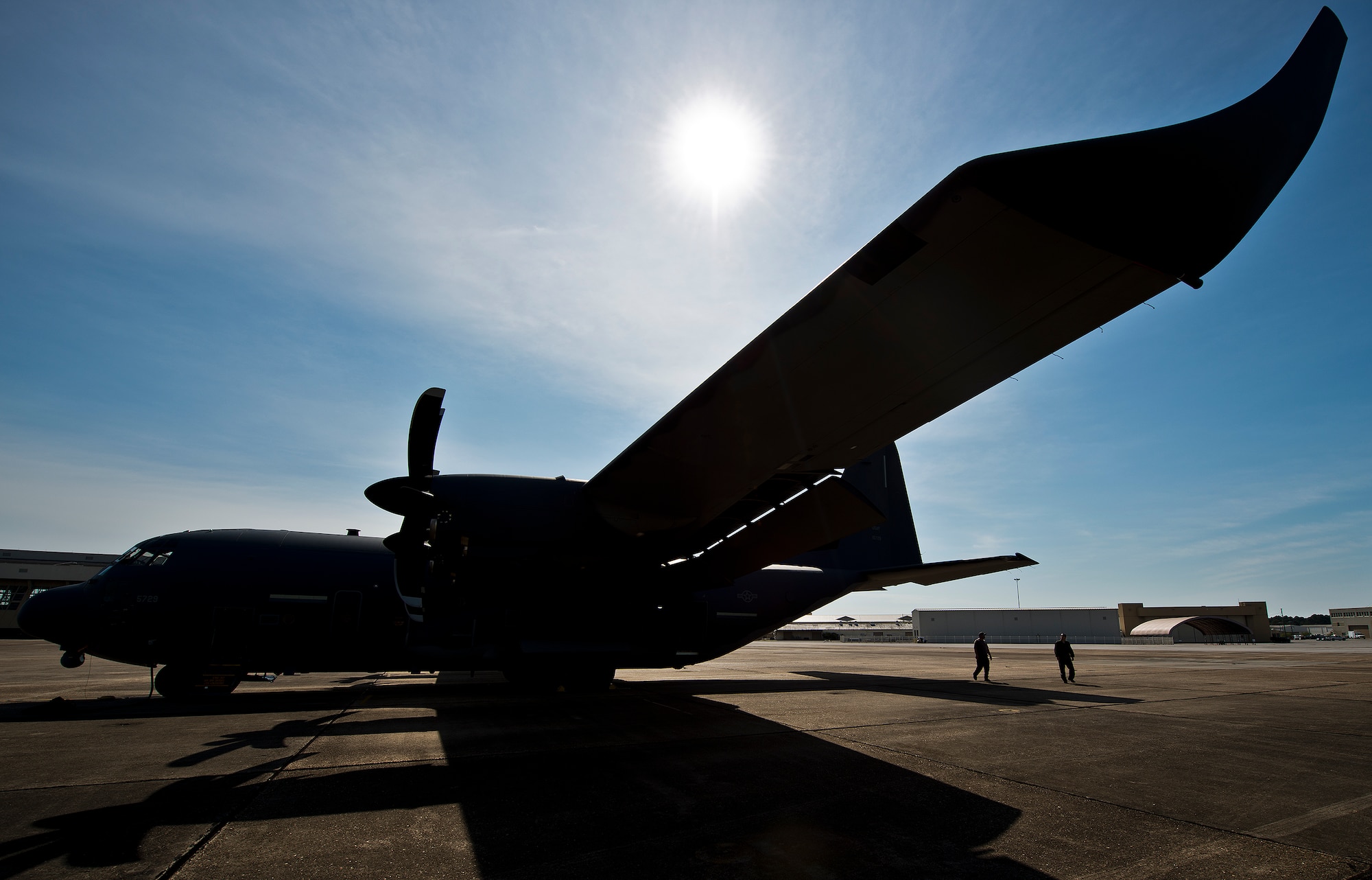 Preflight checks are underway on a modified MC-130J at Eglin Air Force Base, Fla. The test aircraft has been fitted with vertical fins on each wing, called winglets.  The 413th Flight Test Squadron aircrew and engineers tested the modified aircraft over eight flights.  The goal of the tests was to collect data on possible fuel efficiency improvements and performance with the winglets and lift distribution control system installed.  (U.S. Air Force photo/Samuel King Jr.)