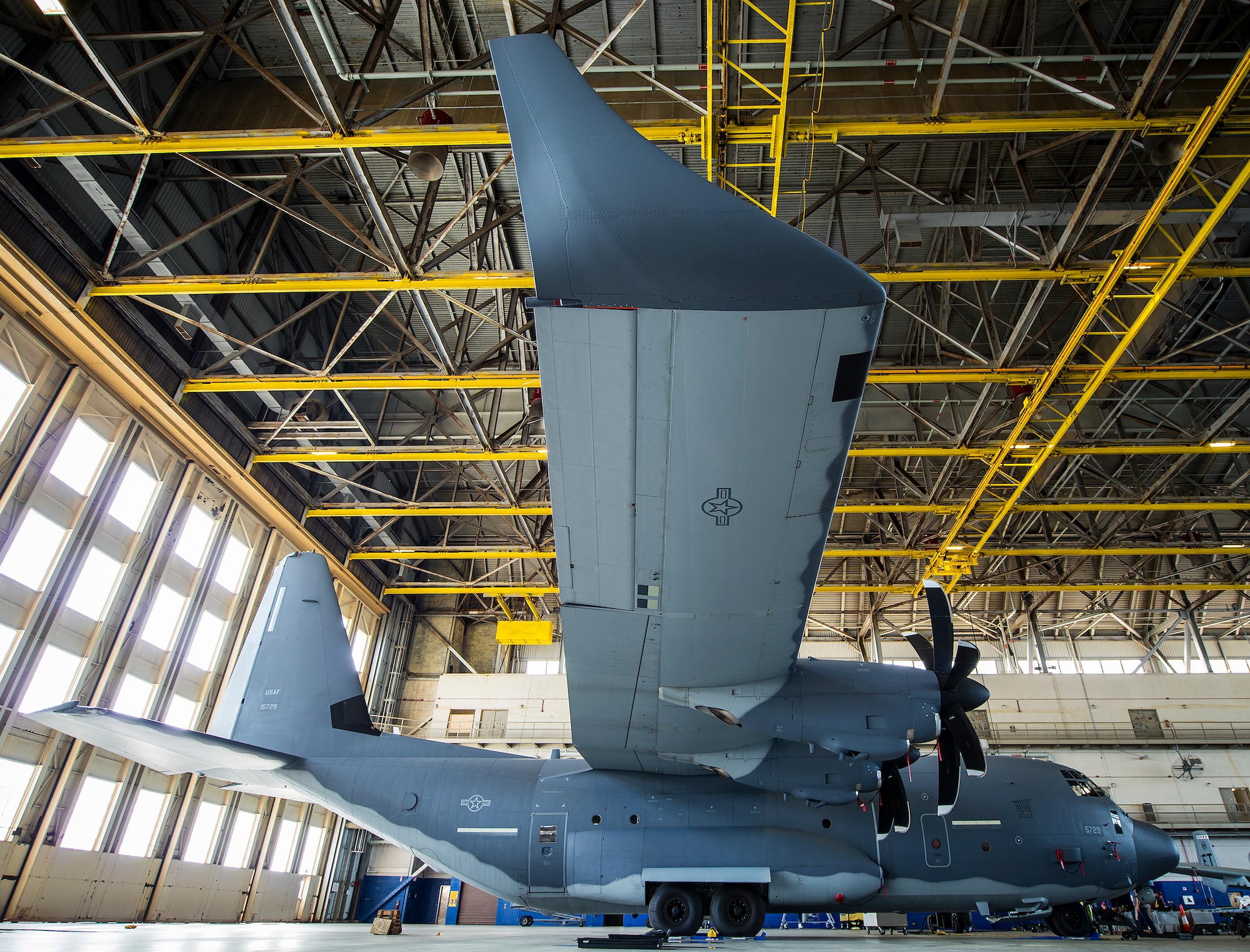 An MC-130J test aircraft sits in King Hangar awaiting its next mission at Eglin Air Force Base, Fla.  The aircraft has been fitted with vertical fins on each wing, called winglets.  The 413th Flight Test Squadron aircrew and engineers tested the modified aircraft over eight flights.  The goal of the tests was to collect data on possible fuel efficiency improvements and performance with the winglets and lift distribution control system installed.  (U.S. Air Force photo/Samuel King Jr.)