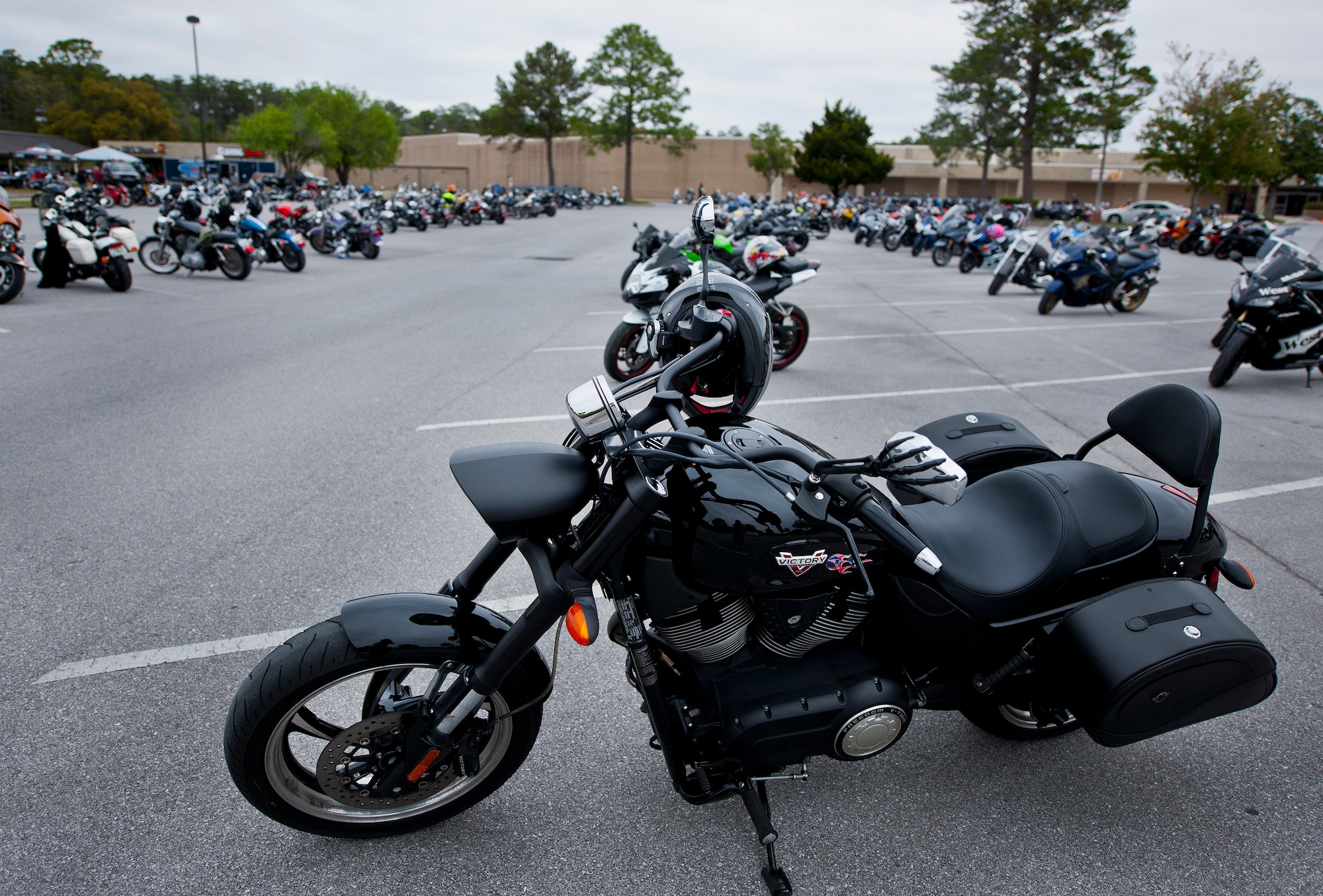 Motorcycles cover the Base Exchange parking lot during the base’s annual motorcycle safety rally April 15 at Eglin Air Force Base, Fla.  More than 500 civilian and military riders rode in for the joint 53rd Wing/96th Test Wing event. (U.S. Air Force photo/Samuel King Jr.)