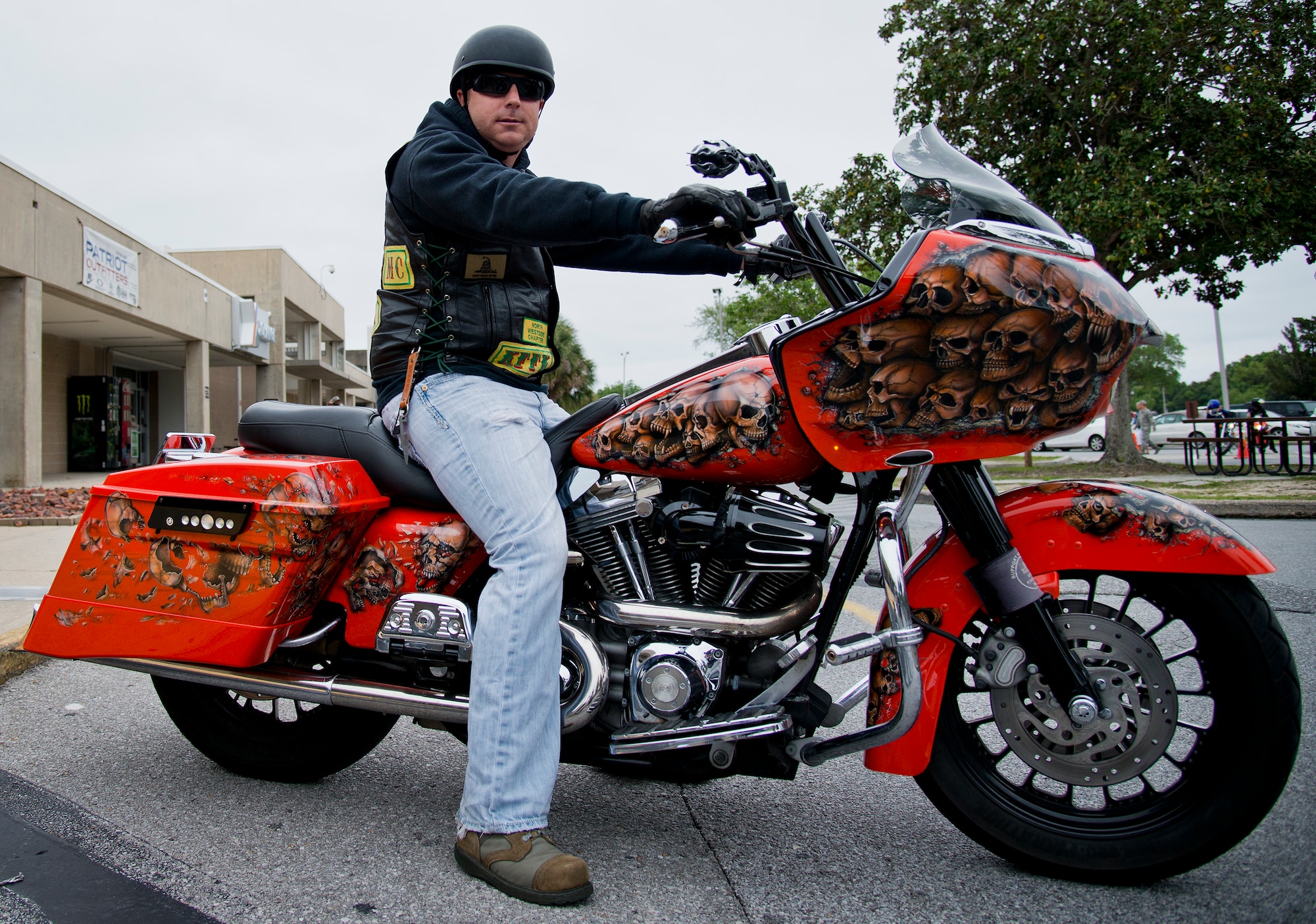 A biker shows off his custom-painted skull bike before taking off from the base’s annual motorcycle safety rally April 15 at Eglin Air Force Base, Fla.  Approximately 600 civilian and military riders rode in for the joint 53rd Wing/96th Test Wing event. (U.S. Air Force photo/Samuel King Jr.)