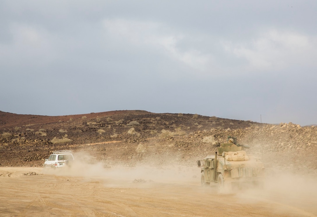 DJIBOUTI, Africa (Apr. 13, 2016)- U.S. Marines and Sailors with the 13th Marine Expeditionary Unit drive to ranges to perform a reconnaissance of training areas in Djibouti, Africa, Apr. 12, 2016. The 13th MEU is conducting sustainment training to maintain proficiency and combat readiness as part of the Boxer Amphibious Ready Group team on a scheduled deployment to the Western Pacific area of operations. (U.S. Marine Corps photo by 1stLt Francheska Soto/ RELEASED)