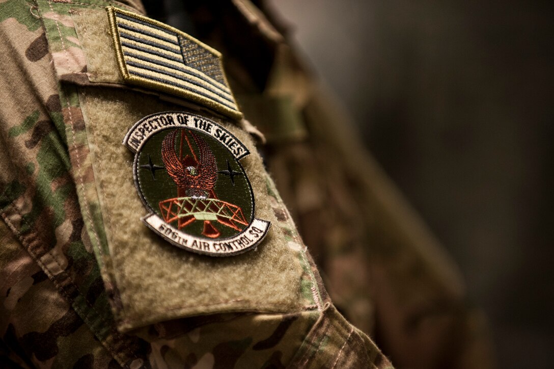 A patch of the 606th Air Control Squadron rests on the shoulder of a 606th ACS Airman April 13, 2016, at Spangdahlem Air Base, Germany. Airmen of the 606th ACS will deploy to Southwest Asia in support of multiple operations. (U.S. Air Force photo by Senior Airman Rusty Frank/Released)