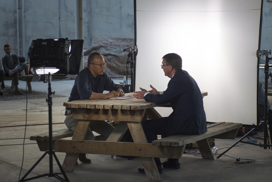 Lester Holt , NBC News reporter, left, interviews Defense Secretary Ash Carter at the Baghdad International Airport, April 18, 2016. DoD photo by U.S. Air Force Senior Master Sgt. Adrian Cadiz