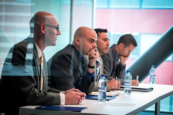 Members of the "Cyber Jedi" team are (left to right) Maj. Zachary Smith; Army Maj. Spencer Calder; Maj. Jose Rivas, the only Air Force reservist on the team; and Maj. Sam Kidd. The team also represented the Air Command and Staff College in the Atlantic Council Cyber 9/12 Student Challenge in Geneva, Switzerland. (Courtesy photo)