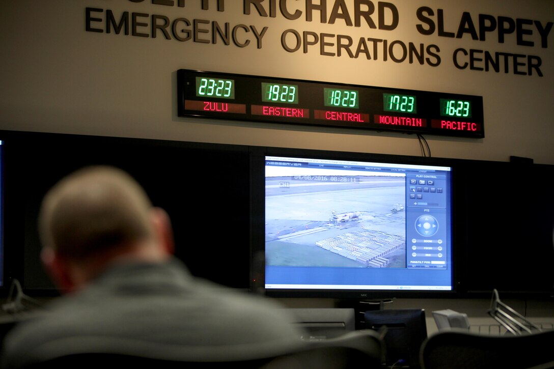 The surveillance of a simulated downed aircraft plays in the Emergency Operations Center during a Mass Casualty Exercise on Marine Corps Air Station Cherry Point, N.C., April 7, 2016.  The exercise was designed to simulate the response if an emergency were to occur. Annually, the air station is required to have exercises to ensure protocol and safety standards are met for potential emergencies. On years the biannual air show occurs, the training revolves around scenarios specific to that kind of event. (U.S. Marine Corps photo by Cpl. Jason Jimenez/Released)