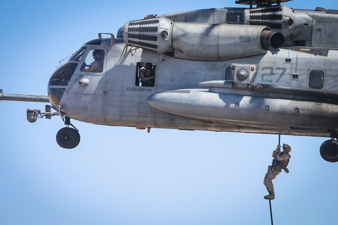 A Marine participates in a fast-rope exercise from a CH-53E Super Stallion helicopter in Yuma, Ariz., April 1, 2016. Marine Corps photo by Staff Sgt. Artur Shvartsberg  