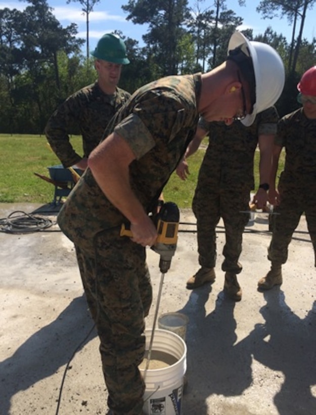 On April 14, 2016 Second Lieutenant Nicholas Downey, a Marine attached to Combat Engineer Officer course 5-16 (CEO 5-16); mixes Pavemend to repair a spall as part of practical application on Airfield Damage Repair (ADR). Pavemend is a concrete which dries and cures very quickly and can support an aircraft’s weight three hours after being set.
