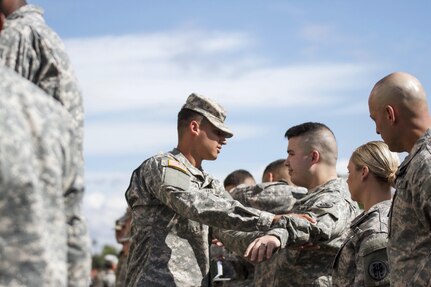 Spc. Alex Johnson from the 387th Military Police Battalion pats down and searches another Soldier before the start of an active shooter training exercise at a training reserve center in Scottsdale, Arizona, April 9. Roughly 150 soldiers were included in the training exercise from various units, to include the 387th MP Bn., the 387th Engineer Battalion and the 91st Operations Training Division. (U.S. Army photo by Sgt. Jennifer Spiker)