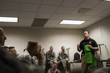 Training Lt. Eric Williams, of the Scottsdale Police Department, briefs soldiers before an active shooter training exercise on April 9 at a training reserve center in Scottsdale, Arizona.  Roughly 150 soldiers were included in the training exercise from various units, to include the 387th Military Police Battalion, the 387th Engineer Battalion and the 91st Operations Training Division. (U.S. Army photo by Sgt. Jennifer Spiker)