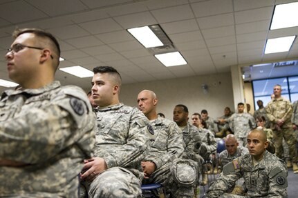 U.S. Army Reserve Soldiers listen to a brief during an active shooter training exercise at the 387th Military Police Battalion on April 9 in Scottsdale, Arizona. Roughly 150 soldiers were included in the training exercise from various units, to include the 387th Military Police Battalion, the 387th Engineer Battalion and the 91st Operations Training Division. (U.S. Army photo by Sgt. Jennifer Spiker)