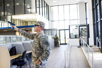 Sgt. 1st Class William Schwietz, a U.S. Army Reserve human resources specialist with the 387th Military Police Battalion, acts as an active shooter during a training exercise at a reserve training center in Scottsdale, Arizona, April 9. Roughly 150 soldiers were included in the training exercise from various units, to include the 387th MP Bn., the 387th Engineer Bn. and the 91st Operations Training Division. (U.S. Army photo by Sgt. Jennifer Spiker)