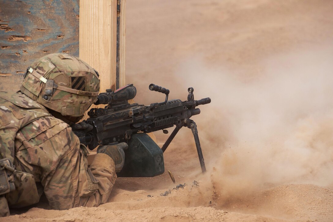 A soldier fires his weapon while participating in small arms training in Arta, Djibouti, April 12, 2016. Air Force photo by Tech. Sgt. Barry Loo